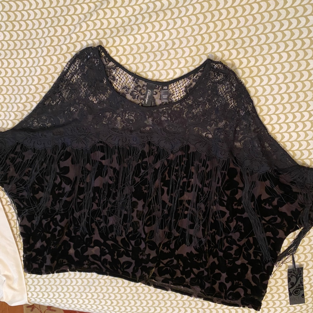 BKE Boutique black lace and sheer burnout Angel wing top with fringe. NWT